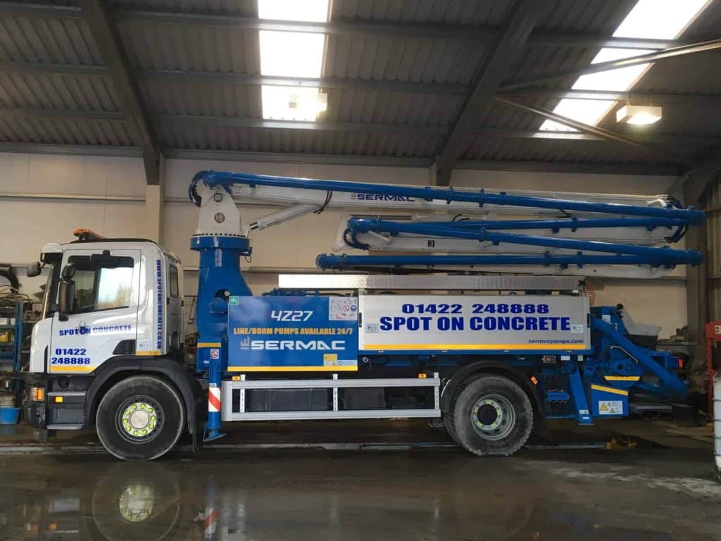 Image of a concrete pumping vehicle from the Spot On Concrete concrete pumping fleet