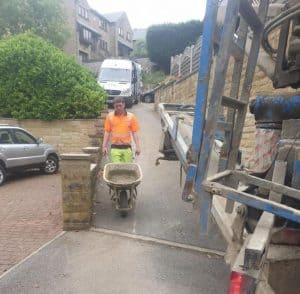 Image of a Spot On Concrete worker providing a wheel barrow service